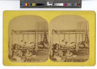 [Man lying on a mechanical invalid bed] [graphic].