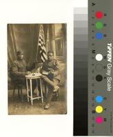 [Real photo postcard portrait showing two African American World War I soldiers posed with an American flag] [graphic].