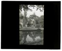 [Unidentified residence near a body of water] [graphic].