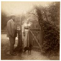 [Elliston P. Morris, Martha Canby Morris, and Jet the dog by wood gate, possibly Sea Girt, NJ] [graphic].
