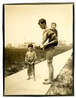 [Man carrying child on his back, Boys Parlors Camp, Wildwood, NJ] [graphic].