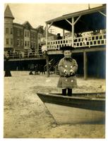 [Elliston Perot Morris Jr. in rowboat on the beach] [graphic].