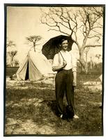 [Boy with an umbrella and a dog, Boys Parlors Camp, Wildwood, NJ] [graphic].