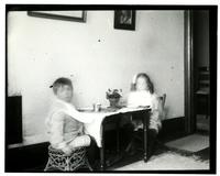[Elliston P. Morris, Jr. and Marriott C. Morris, Jr. at small table set for a meal] [graphic].