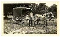[Man with a horse-drawn carriage, Pocono Lake, PA] [graphic].