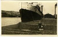 Janet Morris on dock with copper ingots, S.S. Octorara, Great Lakes Trans. Co., Buffalo, NY [graphic].