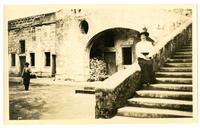 [Woman seated on stone steps] [graphic].