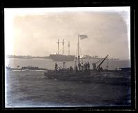 [Group near a pier on an unidentified schooner, an American flag on the mast, possibly Bermuda] [graphic].
