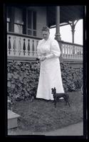 [Woman, possibly Elizabeth Canby Morris, with dog at Avocado, Sea Girt] [graphic].