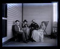Will & Florence Collins, Sam Rohrer & Bess in front porch. [Avocado, Sea Girt, NJ] [graphic].