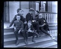 [Group in porch steps. Father, Mother, Uncle William Canby, Henry Mathews Canby, Marriott C., Bessie & Sam, Avocado, Sea Girt, NJ] [graphic].