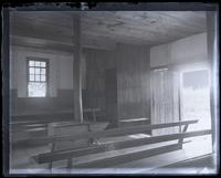 Interior of [Manasquan] meeting house, wood-closet cor[ner] showing stairs up to left, [Manasquan, NJ] [graphic].