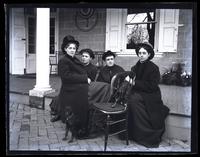 Group. Ellie & Anna Rhoads, Bessie & Sam [Porch of Deshler-Morris House, 5442 Germantown Avenue] [graphic].