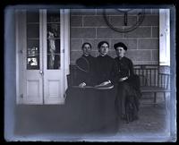 [Ellie Rhoads, Anna Rhoads, & Bessie. Porch of Deshler-Morris House, 5442 Germantown Avenue] [graphic].