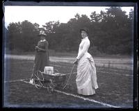 Alice Shipley & B[essie] C. M[orris] with wagon marking out tennis court, [Sea Girt, NJ] [graphic].