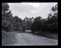 [Charles & Phoebe] Wright's new house from road in Park at Sea Girt near tennis court [graphic].