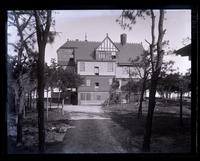 [Charles & Phoebe] Wright's house from the back by the stable. Men putting on shutters. [Sea Girt, NJ] [graphic].