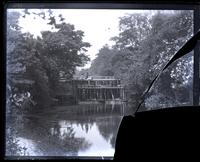 Overflow of the mill, Bella [Wistar], Edith [Wistar] & Bess on bridge, [Sea Girt, NJ] [graphic].