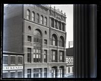 Leopold building & one next to it, Baltimore St. Baltimore, [MD], upper stories only [graphic].