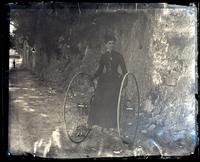 Miss Schenkl on a tricycle, back of Hamilton H[otel], [Bermuda] [graphic].