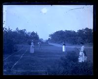 [View of tennis court, Sea Girt, NJ. Sallie Emlen, John Cope, Pattie & Gertrude Mellor on court] [graphic].