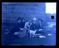 Group at foot of [Navesink] lighthouse at summit of hill. Anna Sharpless, Lena Goodwin, G[eorge] V[aux] Jr, Bess & Mother. [Sandy Hook, NJ] [graphic].