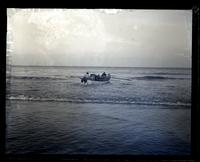 Capt. [David N.] Curtis' boat going out over breakers, [Sea Girt, NJ] [graphic].