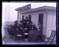 Group of party on "Taurus" on ocean off Monmouth Beach [NJ] - Helen, Molly, Elizabeth, Ellen, Bessie & Dick Morris, Fred Baker & Father [graphic].