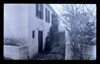 Steps of above [Old Perot] House. Mrs. Dickinson, her son, & Father on steps. [Bermuda] [graphic].