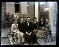 Group on porch at [Deshler-Morris House], 4782 Main St., [Germantown]. Lily Ellicott, Marriott Canby, Father, Geo. S. Morris, Geo Vaux, Jr. & Bess [graphic].