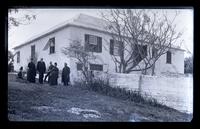 Old Perot house. (Mrs. Dickinson's) near Heron Bay, where Elliston & John Perot were born. Bess, co[u]s[ins] Morris & Rebecca Perot, Mr. Syphur & Father, Mother on picture. [Bermuda] [graphic].