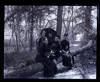 Group on fallen tree. Bartram's Garden. Mrs Shoemaker, Bird & Minnie Tyson Shoemaker, Minnie Kimber & Bess [graphic].