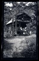 [Group on porch steps], Pocono Lake, [PA] [graphic].