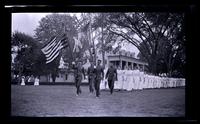 Girls passing Mansion House, [Hampton Institute, Va.] [graphic].