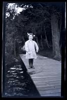 [Girl, probably Janet Morris, on a boardwalk], Carnival, Pocono Lake, [PA] [graphic].