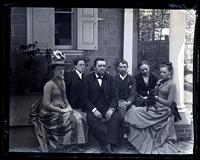 [Group on porch at Deshler-Morris House, 4782 Main St., Germantown. Lily Ellicott, Marriott Canby, Father, Geo. S. Morris, Geo Vaux, Jr. & Bess] [graphic].