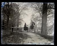 Life on the rail, Minnie Tyson Shoemaker & Minnie Kimber on fence at Bartram's Garden [graphic].