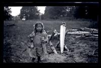 [Janet Morris carrying wood], Pocono Lake, [PA] [graphic].