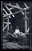 [Elliston Perot Morris Jr. and Marriott Canby Morris Jr. in an unfinished house], Pocono Lake, [PA] [graphic].