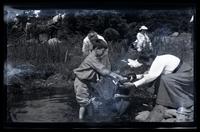 [Marriott Canby Morris Jr., Janet Morris, and Jane Rhoads Morris playing in], Pocono Lake, [PA] [graphic].