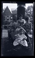 J[ane] R[hoads] M[orris] reading to her kids. 131 W. Walnut La[ne], [Philadelphia] [graphic].