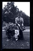 [Jane Rhoads Morris and Janet Morris near rosebush], rose Time at 131 W. Wal[nut Lane] [graphic].