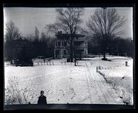 [Marriott Canby Morris Jr. in front of large house in the snow] [graphic].