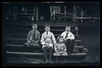 [Marriott Canby Morris Jr., Janet Morris, and Elliston Perot Morris, Jr. on porch steps], Pocono Lake, [PA] [graphic].