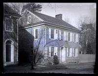 Front view of 4774 Main St. [Bruner & George Livery] from Wilson Woods & Co, pavement opposite [graphic].