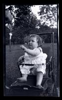Janet Morris in yard, 131 W. Walnut La[ne], [Philadelphia] [graphic].