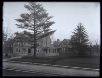 [View of house in Pelham neighborhood. Two boys stand in the foreground] [graphic].