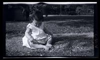 Janet Morris in yard, 131 W. Walnut La[ne], [Philadelphia] [graphic].