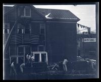 [Patriotic decorations on building facade near Germantown Boys' Club, 10 W. Penn Germantown] [graphic].