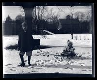 [Marriott Canby Morris Jr. pulling Janet Morris on a sled, 131 W. Walnut Lane] [graphic].